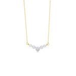 A delicate gold chain necklace featuring a curved bar pendant with a central silver-toned heart-shaped pavé setting, shown on a clean white background.