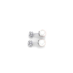 Classic pearl stud earring set in polished 14K white gold, finished with a secure butterfly pushback closure for comfortable everyday wear.