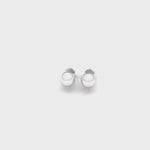 Classic pearl stud earring set in polished 14K white gold, finished with a secure butterfly pushback closure for comfortable everyday wear.